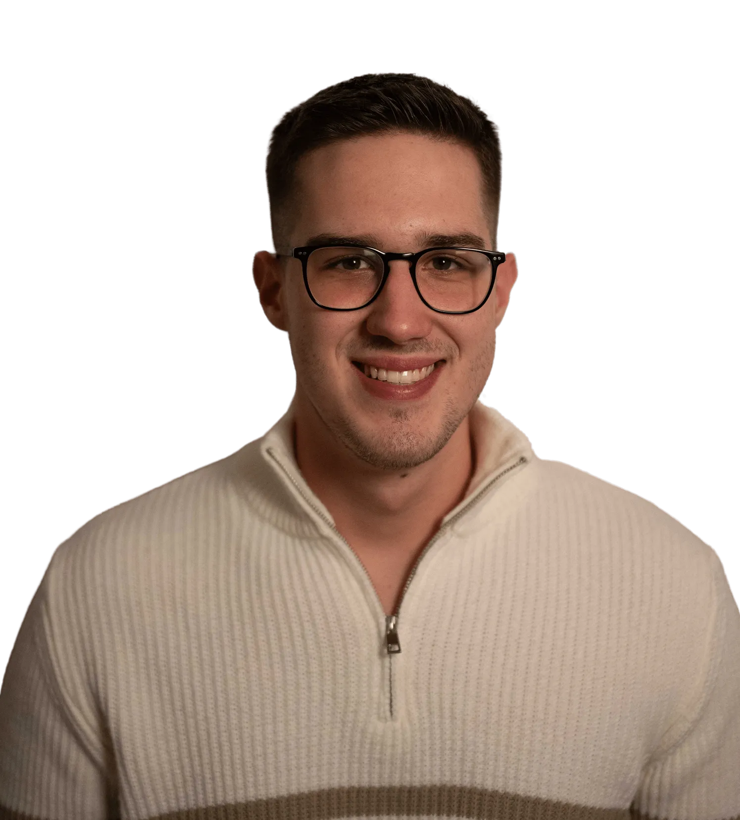Smiling young man with short dark hair and glasses wearing a cream-colored zip-up knit sweater.